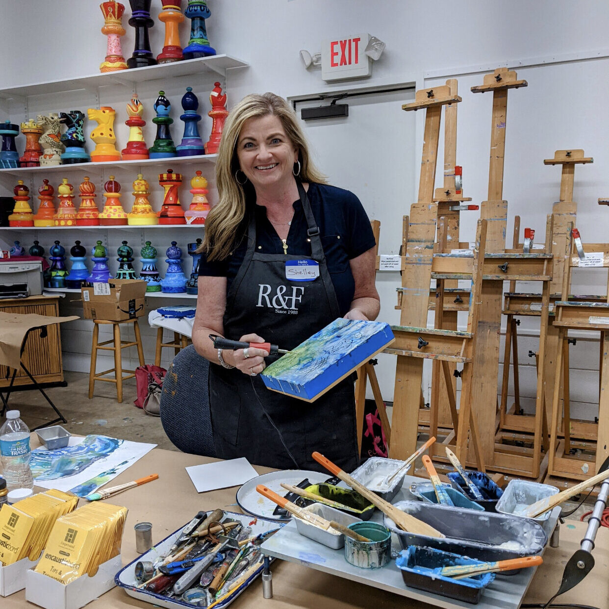 shelley jean posing inside island arts workshop