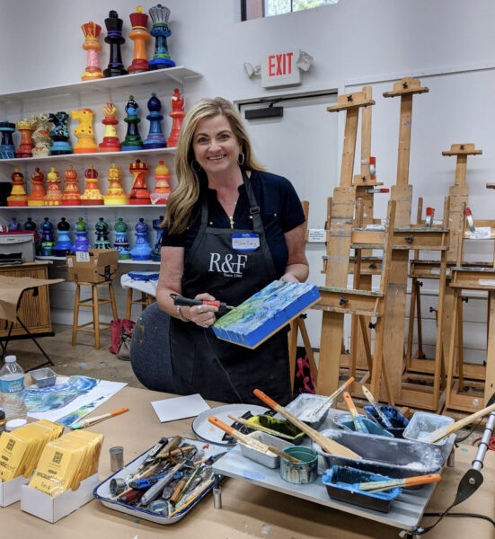 shelley jean posing inside island arts workshop